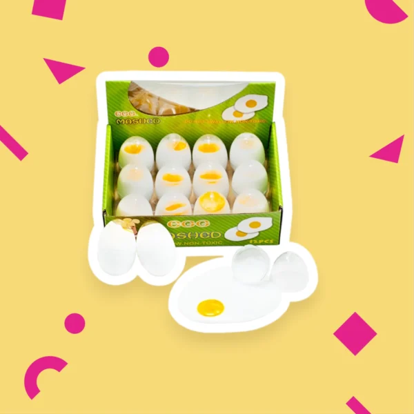 Leksaksslime-ägg med realistiska gula och vita färger i en kartong, utformade för att efterlikna riktiga ägg