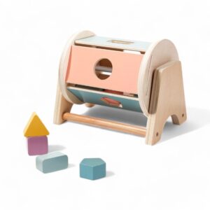 Montessori snurrtrumma med pastellfärgade geometriska former